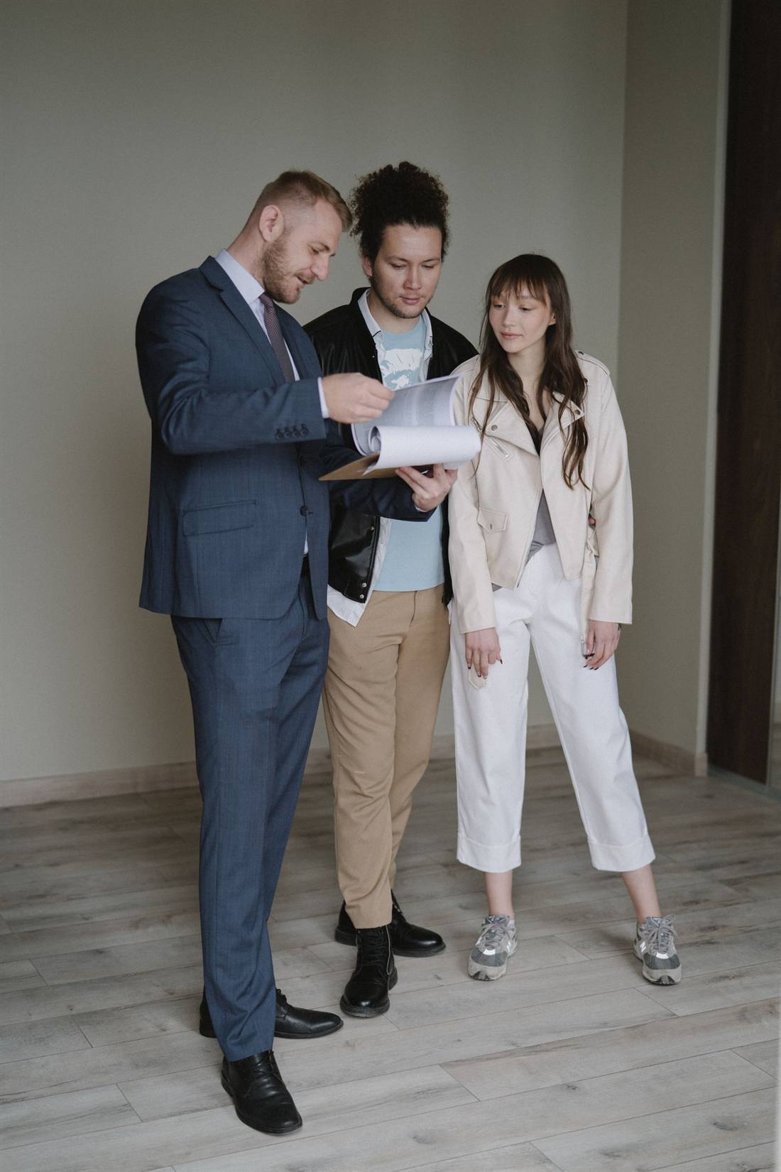 A couple reviewing their mortgage options with an advisor